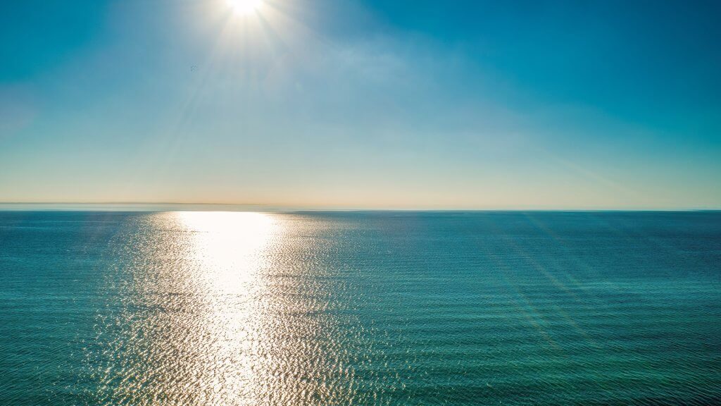 A view of a blue ocean during the daytime